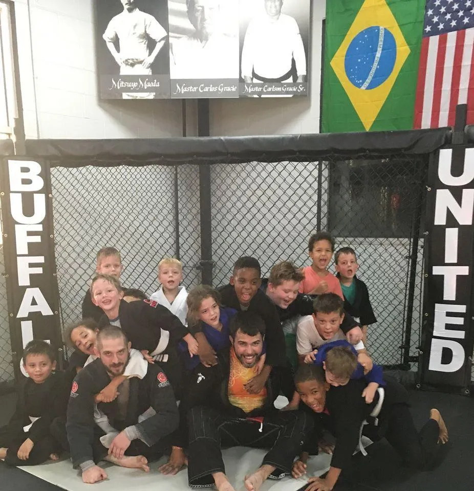 Kids class sharing a fun moment with Buffalo United coaches