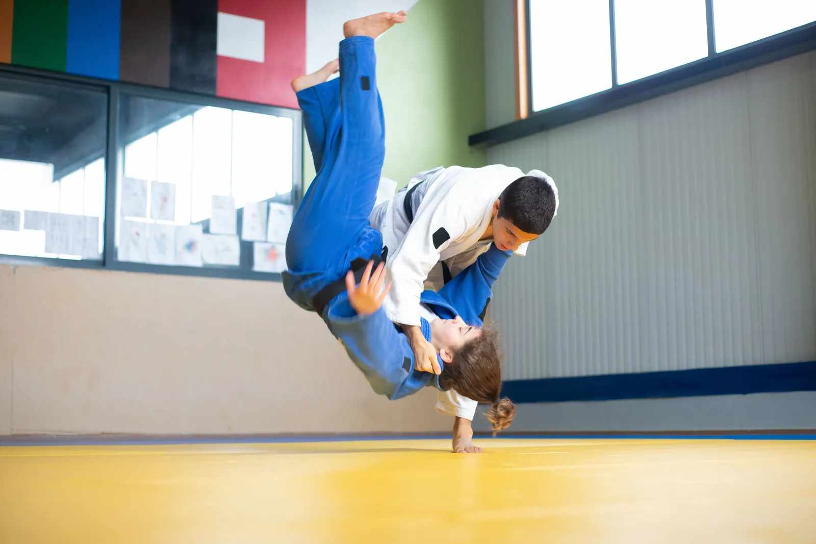 Gi grappling on the mat